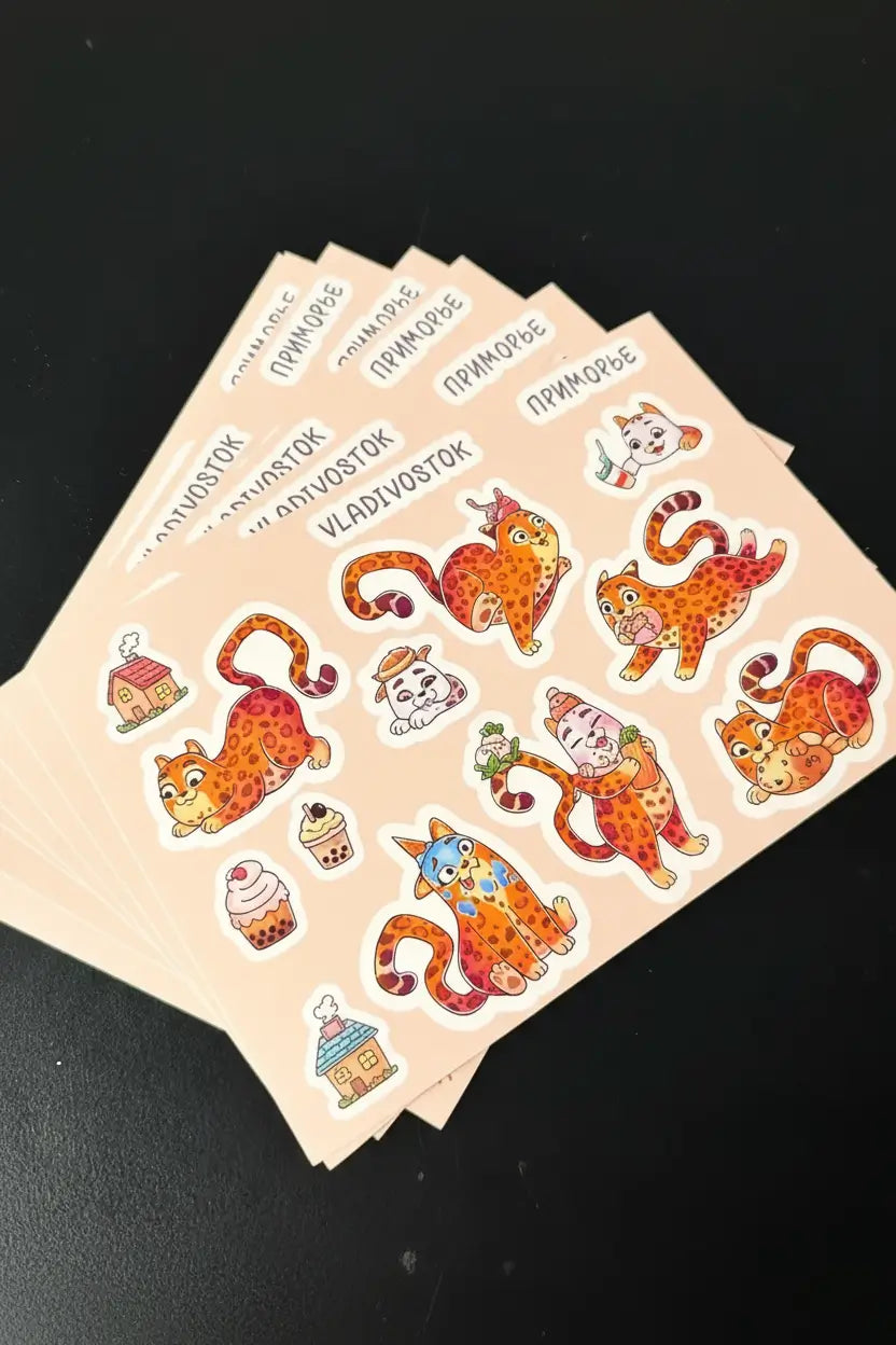 Waterproof custom vinyl sticker sheet with water droplets showing water-resistant surface