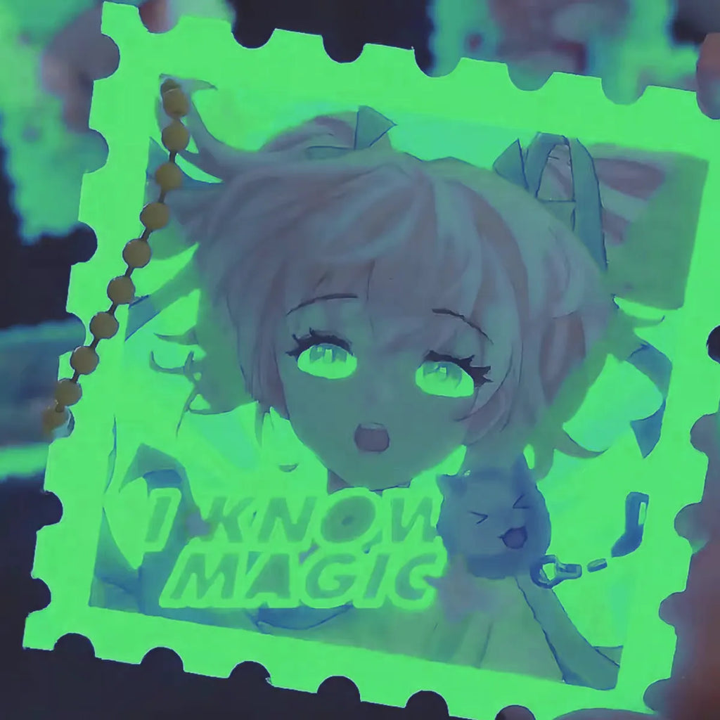 Custom glow-in-the-dark acrylic pins and keychains glowing together in the dark – group display