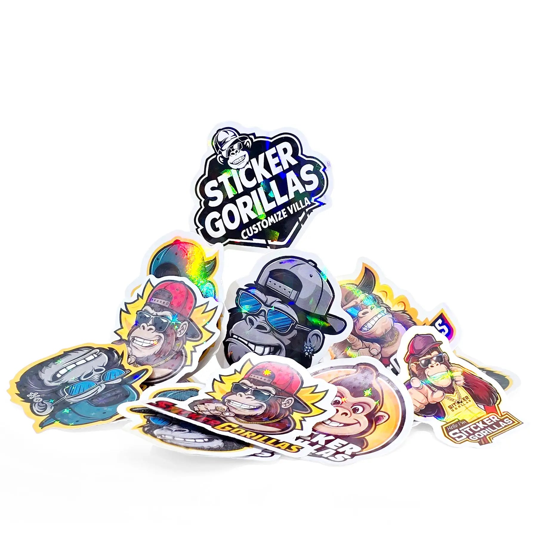 Stack of custom die cut stickers showcasing matte, glossy and holographic laminate finishes in various shapes and sizes