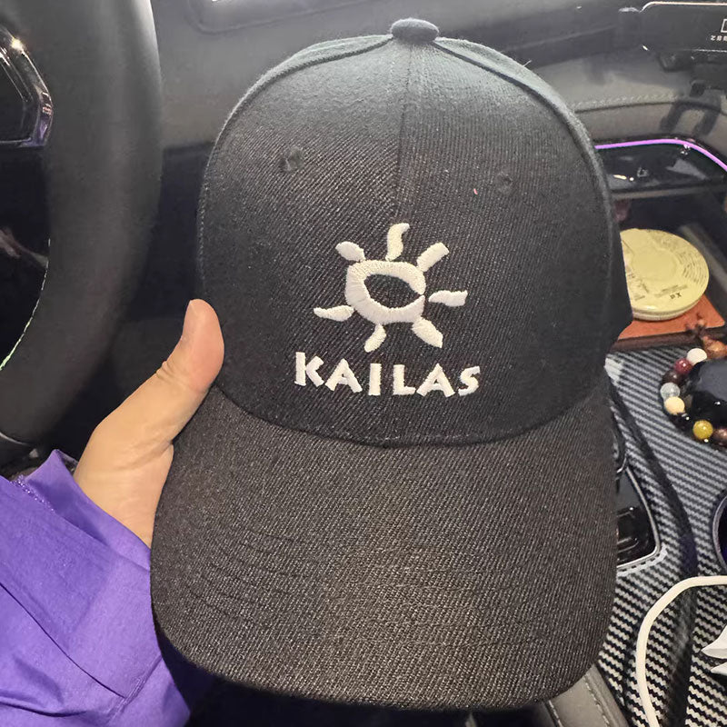 Black cap with a white embroidered sun logo and brand name on the front