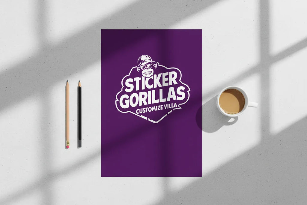 Custom poster flat lay on neutral desk surface with coffee cup and pencils, top-down overhead product photography