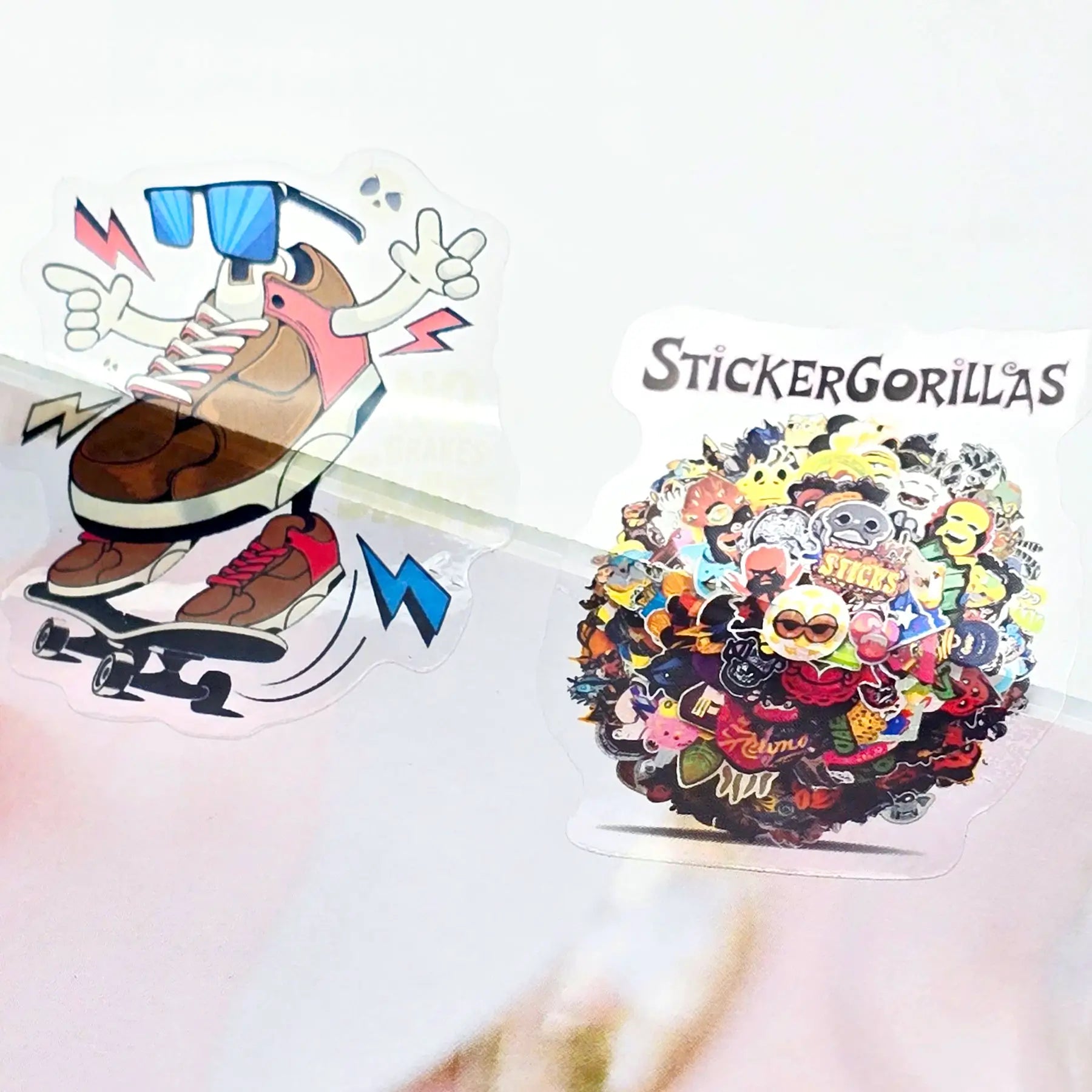 Custom transparent stickers used on laptops, gift boxes, and event branding materials