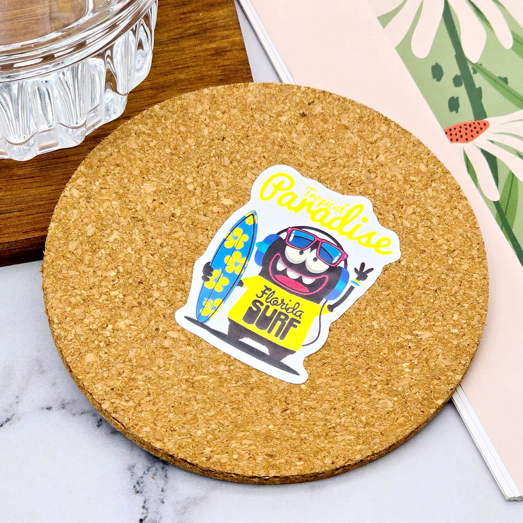 Custom waterproof PVC sticker applied on drink coaster, showing water resistance and vibrant full-color print quality