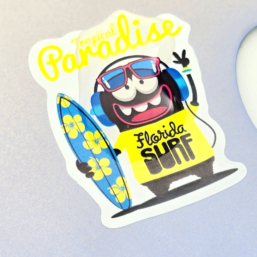 Custom waterproof vinyl stickers applied on laptop lid, colorful die-cut PVC decals for personal and brand customization
