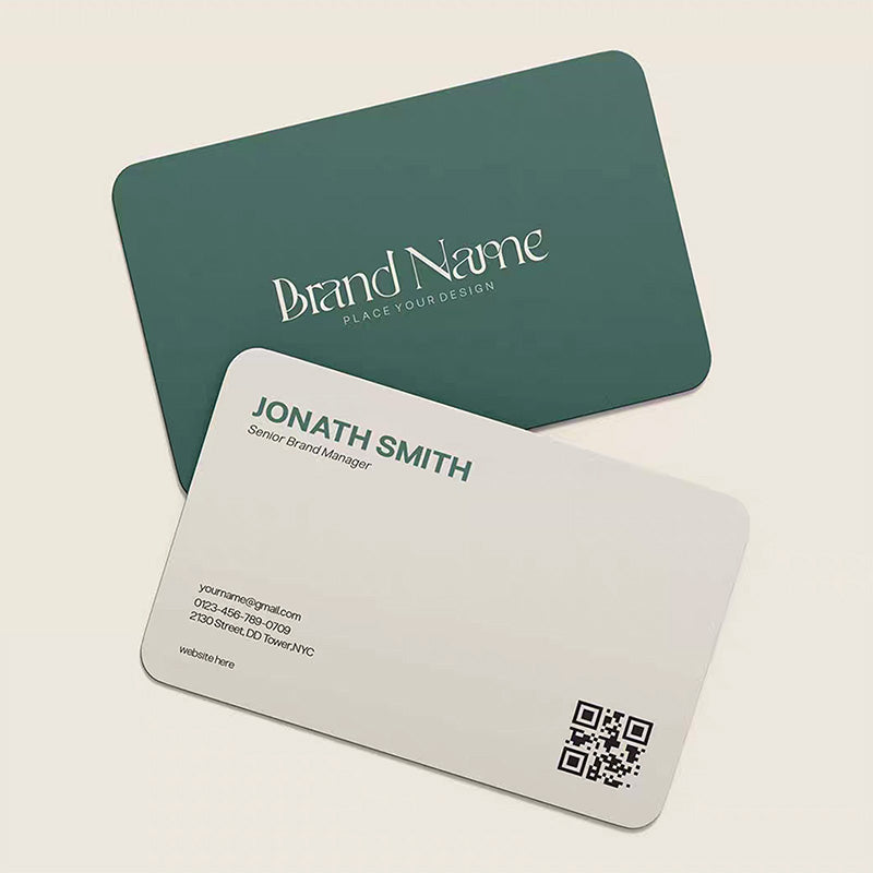 Close-up of a 100% waterproof PVC business card surface that resists moisture and stains.
